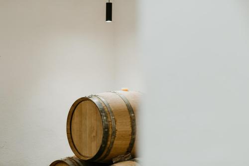 a wooden barrel sitting on top of a table at Perelli Winery in Bucine