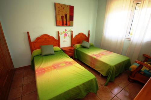 Posteľ alebo postele v izbe v ubytovaní Riumar "Mariposa", 300m to beach, private pool, On-Site-Service, dog beach