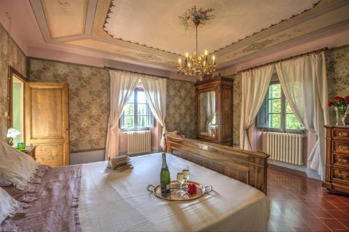 Ένα ή περισσότερα κρεβάτια σε δωμάτιο στο Palazzo Rosadi