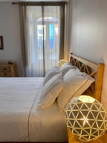 Ένα ή περισσότερα κρεβάτια σε δωμάτιο στο TikLiving