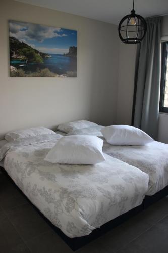 Кровать или кровати в номере La campagne Pramaïsse
