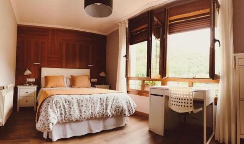 מיטה או מיטות בחדר ב-Hotel Rural El Torrejon