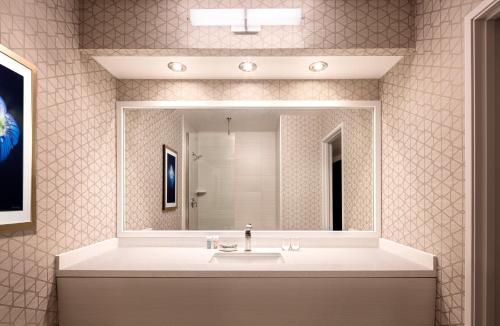 a bathroom with a sink and a mirror at Luxor in Las Vegas