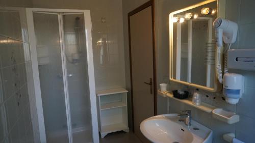 Koupelna v ubytování Hotel Quattro Palme