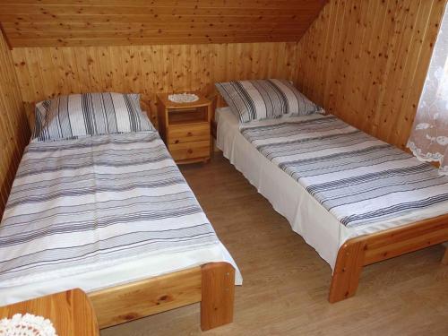 Lova arba lovos apgyvendinimo įstaigoje Holiday home in Koröshegy - Balaton 41048