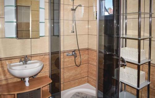 a bathroom with a sink and a shower at Holiday home in Siofok - Balaton 40758 in Siófok