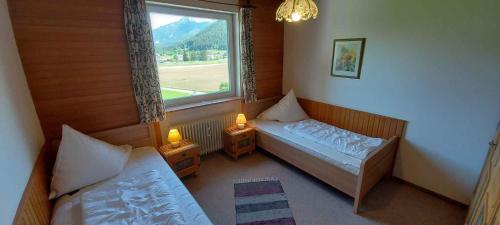 Säng eller sängar i ett rum på Apartment Bad Mitterndorf/Steiermark 432