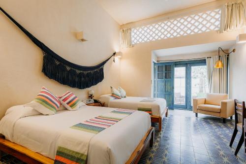 Postel nebo postele na pokoji v ubytování Hotel Waye