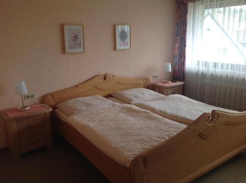 Ein Bett oder Betten in einem Zimmer der Unterkunft Landgasthof zum Wiesengrund