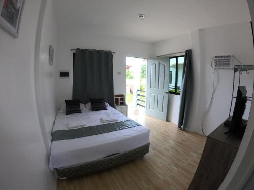 Postel nebo postele na pokoji v ubytování Paradise Beach Guest House
