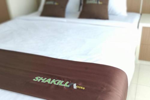 Cama o camas de una habitación en Shakilla House 1A Syariah