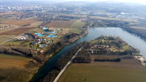 an aerial view of a river with a park at Betli Panzió in Zalaegerszeg