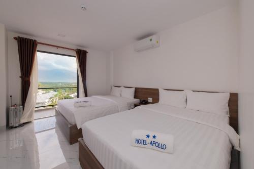 Ένα ή περισσότερα κρεβάτια σε δωμάτιο στο HoTel APOLLO VACATION