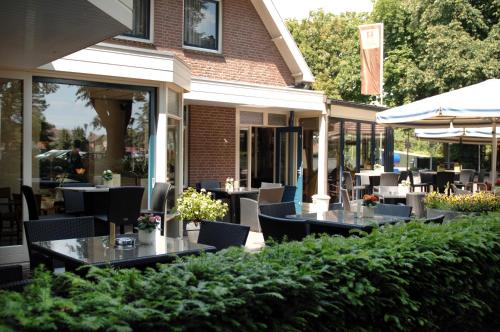 Hotel Hof van Twenteにあるレストランまたは飲食店