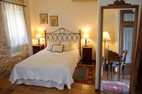 
Cama o camas de una habitación en Hotel Rural Entre Os Ríos
