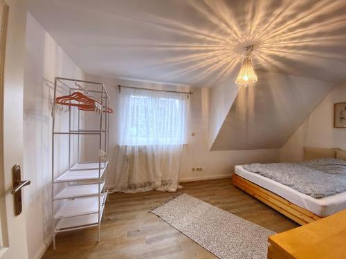 Una cama o camas en una habitación de Eckernförder Glück