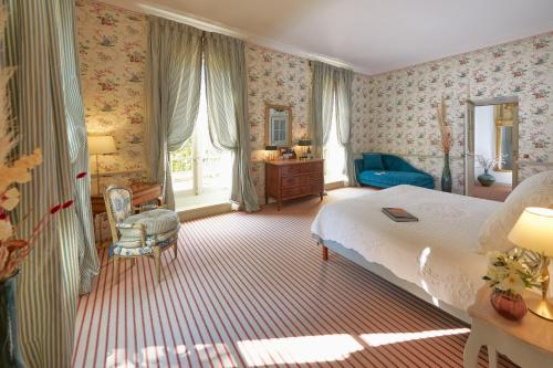 Ένα ή περισσότερα κρεβάτια σε δωμάτιο στο Chambre d'hôtes Château Gigognan