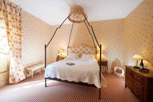 Katil atau katil-katil dalam bilik di Chambre d'hôtes Château Gigognan