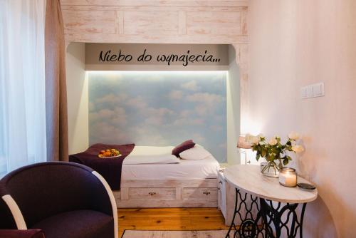 Postel nebo postele na pokoji v ubytování Hotel Podklasztorze