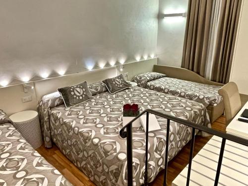 Una cama o camas en una habitación de Hotel Vivit ***S