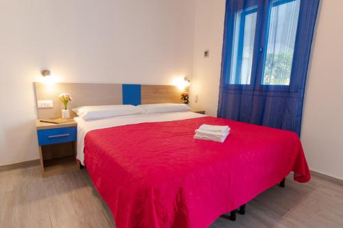 Katil atau katil-katil dalam bilik di Bed & Blu