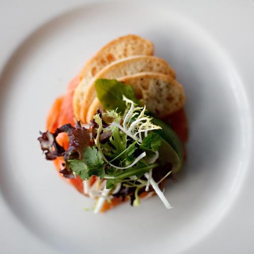 a plate of food with a salad and bread at Links Country Park Hotel in Cromer