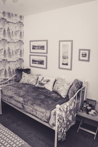 a bedroom with a bed in a room at Invergarry Room Only Guest House For Adults in Windermere