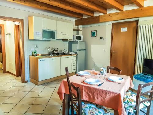 A kitchen or kitchenette at Appartamenti San Francesco