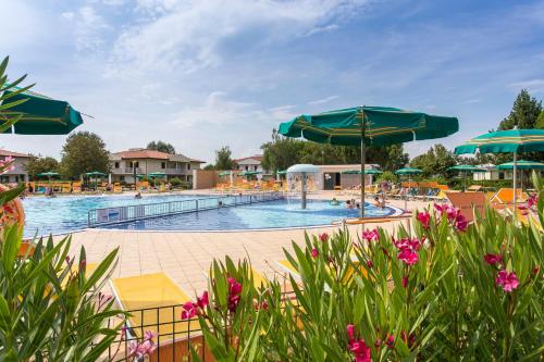 The swimming pool at or close to Apartments in Caorle 24705