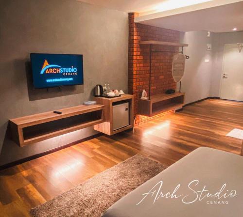 TV a/nebo společenská místnost v ubytování Arch Studio Cenang