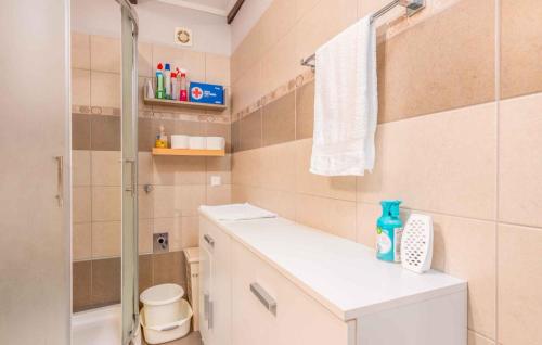 a bathroom with a shower and a toilet and a sink at Apartment in Klimno/Insel Krk 34437 in Klimno