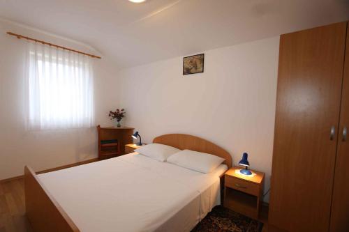 Ένα ή περισσότερα κρεβάτια σε δωμάτιο στο Two-Bedroom Apartment in Silo VII