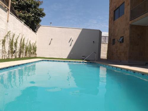 Bazén v ubytování Nuevo Hotel Constitucion nebo v jeho okolí