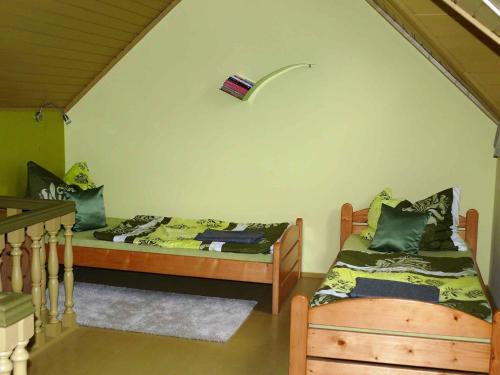 A bed or beds in a room at Apartment in Balatonkeresztur 35398