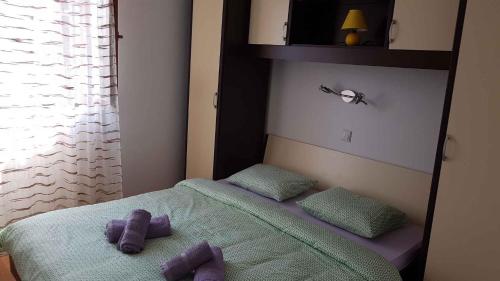 Posteľ alebo postele v izbe v ubytovaní Dobrinj Apartment 2
