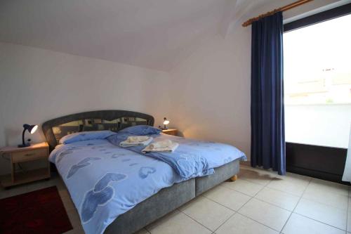 Säng eller sängar i ett rum på Apartment in Porec/Istrien 10332