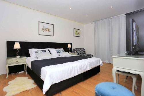 Posteľ alebo postele v izbe v ubytovaní Holiday home in Kukljica