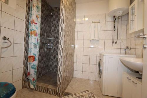 a bathroom with a shower and a sink at Apartment in Silo/Insel Krk 13587 in Šilo