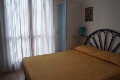 Кровать или кровати в номере Apartment in Rosolina Mare 29520