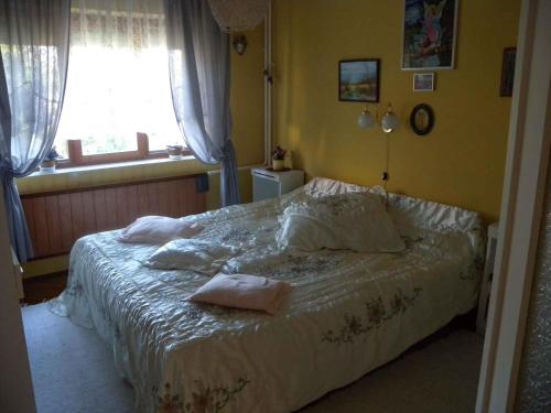 Apartment in Siofok/Balaton 19664にあるベッド