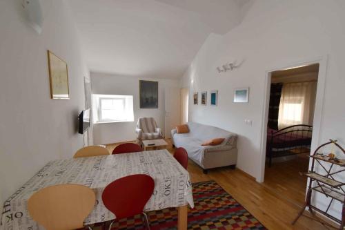 En eller flere senge i et værelse på Biograd na Moru Apartment 1