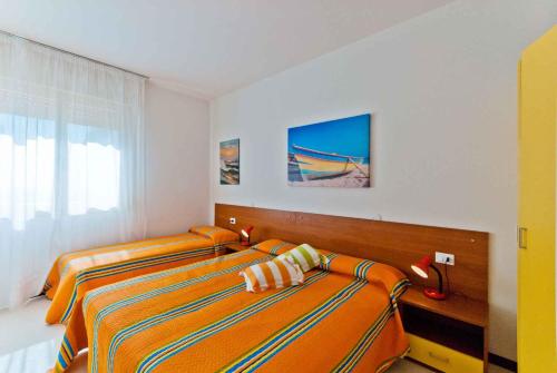 Katil atau katil-katil dalam bilik di Apartments in Bibione 25583