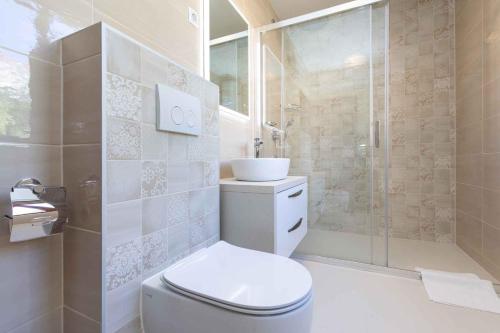a bathroom with a toilet and a sink and a shower at Apartment in Silo/Insel Krk 13438 in Šilo