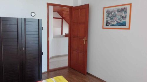 a room with a door and a picture on the wall at Apartment Balatonlelle 6 in Balatonlelle