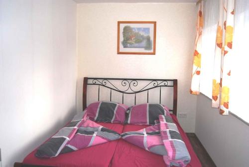 Katil atau katil-katil dalam bilik di Holiday home Ummanz 1