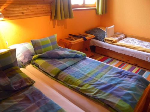 Giường trong phòng chung tại Holiday home Balatonfűzfo/Balaton 18801
