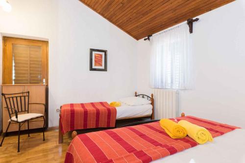 Posteľ alebo postele v izbe v ubytovaní Apartment in Plomin/Istrien 8772