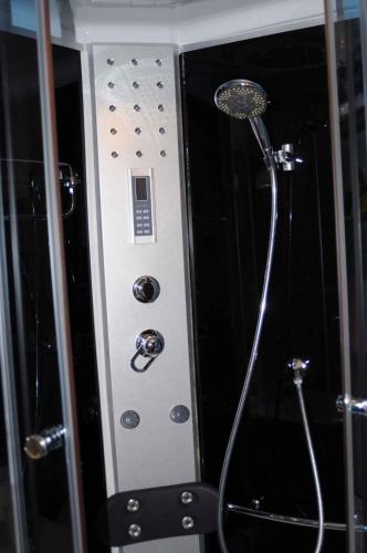 a shower in a bathroom with a shower head at Studio in Bad Aussee - Steiermark 428 in Bad Aussee