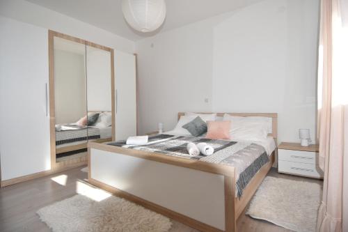 Posteľ alebo postele v izbe v ubytovaní Apartment *Biba*