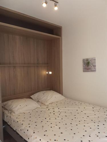 Postel nebo postele na pokoji v ubytování appartement vue mer